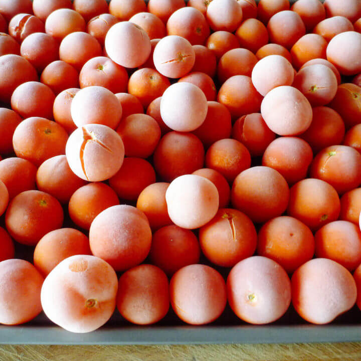 Close-up of frozen whole cherry tomatoes